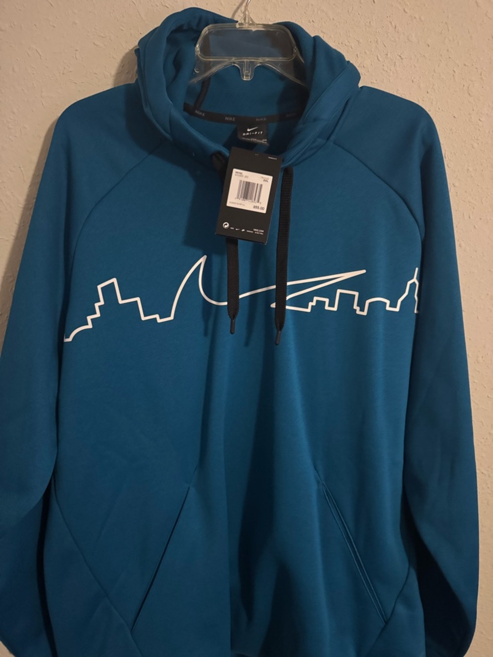 Nike Teal Hoodie with White Skyline Swoosh